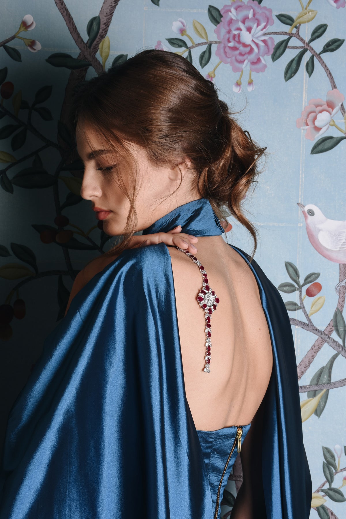 Royal, reference RY.01, worn on the back of a blue satin gown