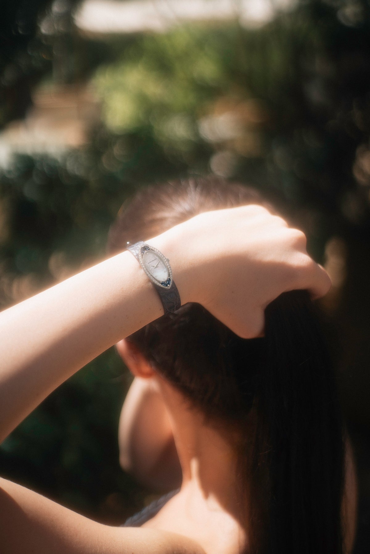 Silhouette, reference SI.09.2, on a blue strap in sunlight
