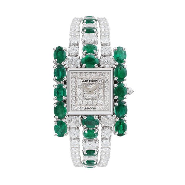 white diamond watch and emerald stones.