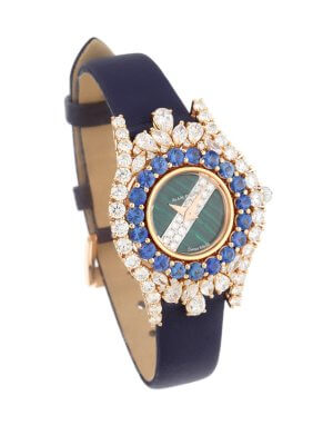 luxury watch with marquise diamonds with round saphhire stones