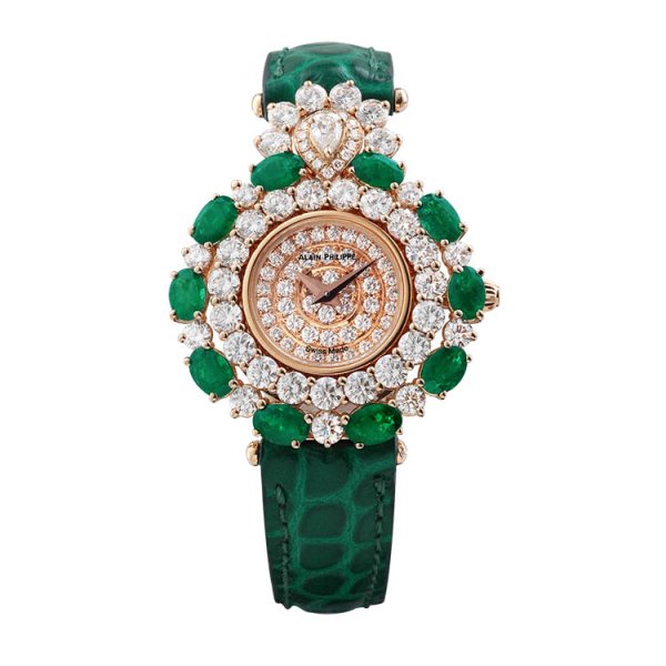 white diamonds timepiece and Emerald stones